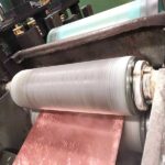 Nonwoven mill roll wringer roll for copper sheet surface cleaning